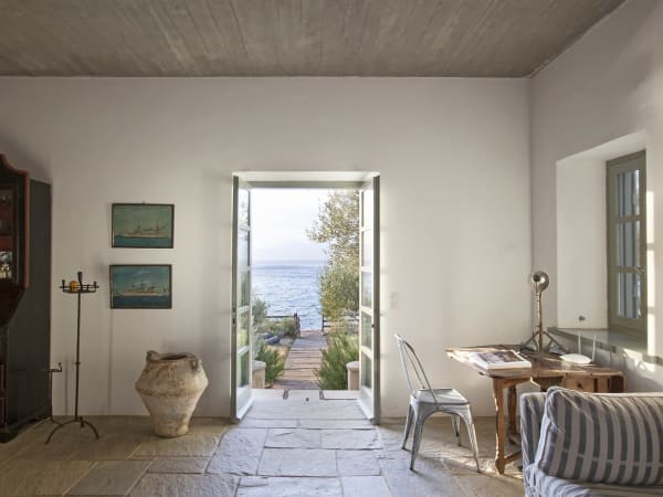 Part of the spacious open-plan communal area with its views out to sea.